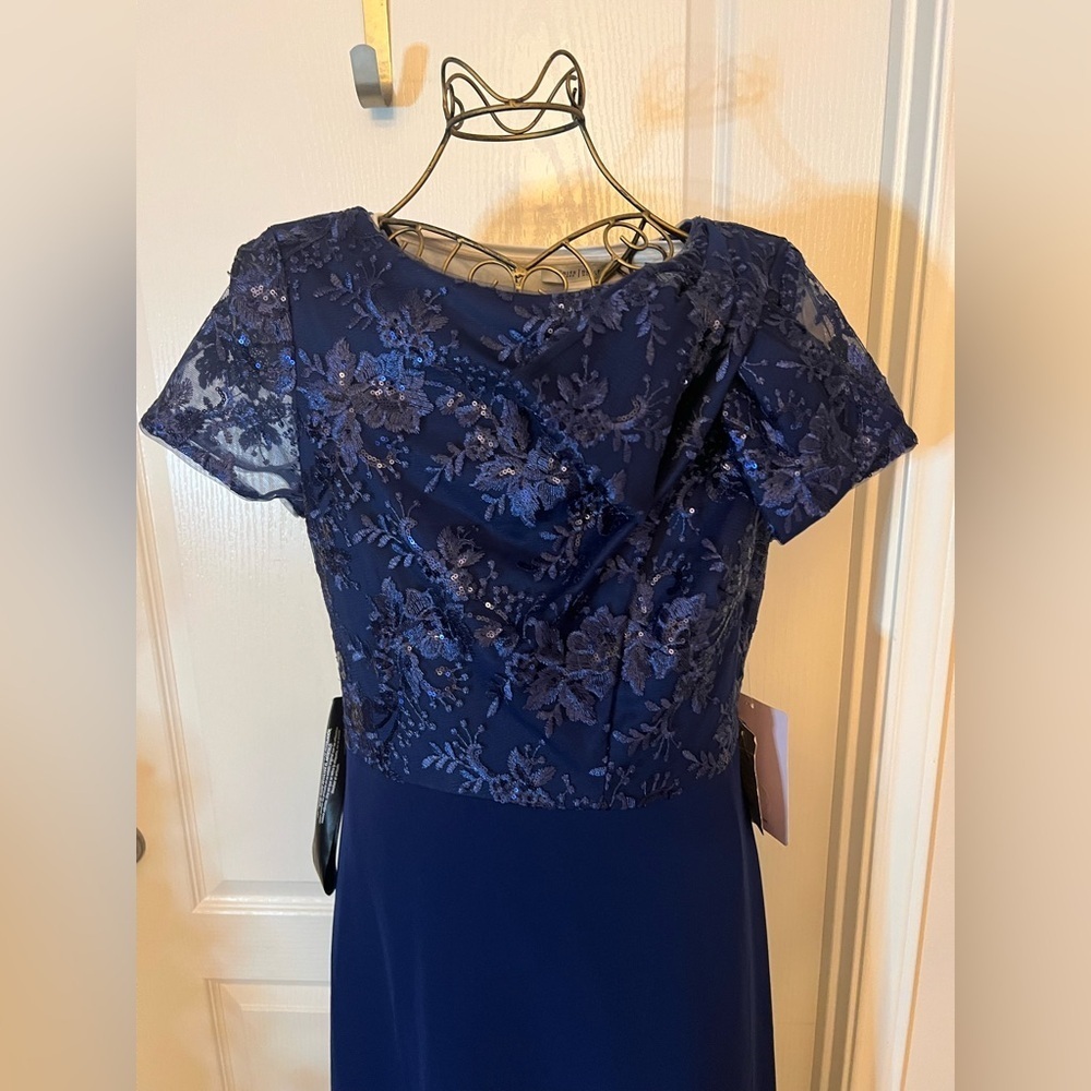 Rae Floral Embroidered Bow Detail A-Line Gown
JS Collections - Picture 6 of 13